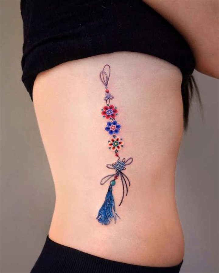 Stunning Floral Rib Tattoos: An Exquisite Art Form